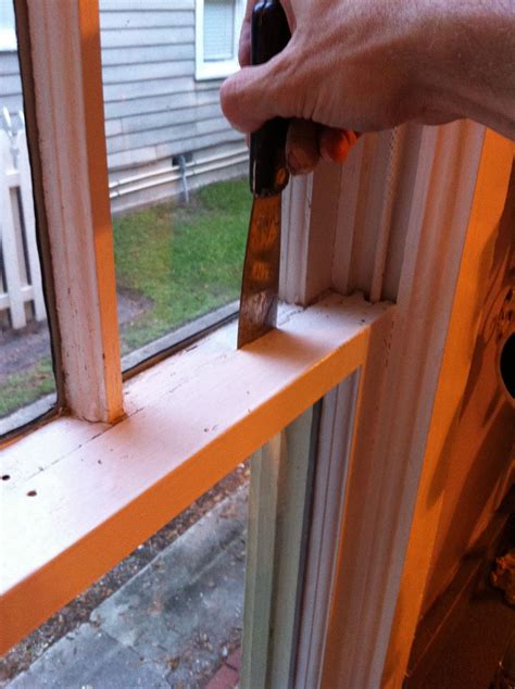 cant get old wood windows with metal bracket open|can you open a stuck window.